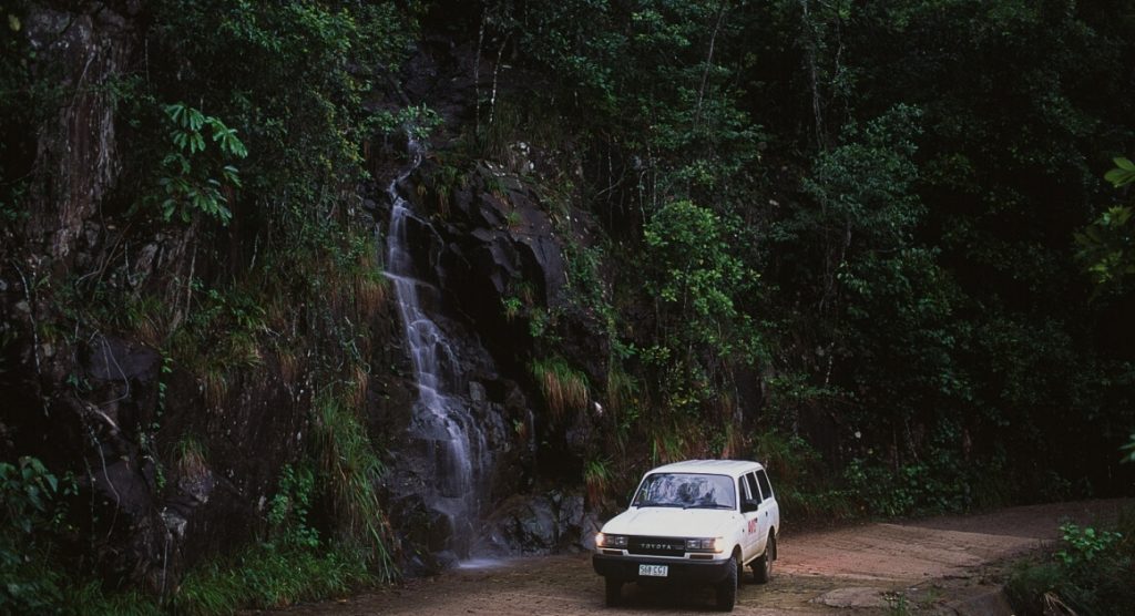 Car and waterfall